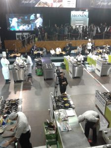 A wide angle view of a cooking competition multi camera switching and IMAG